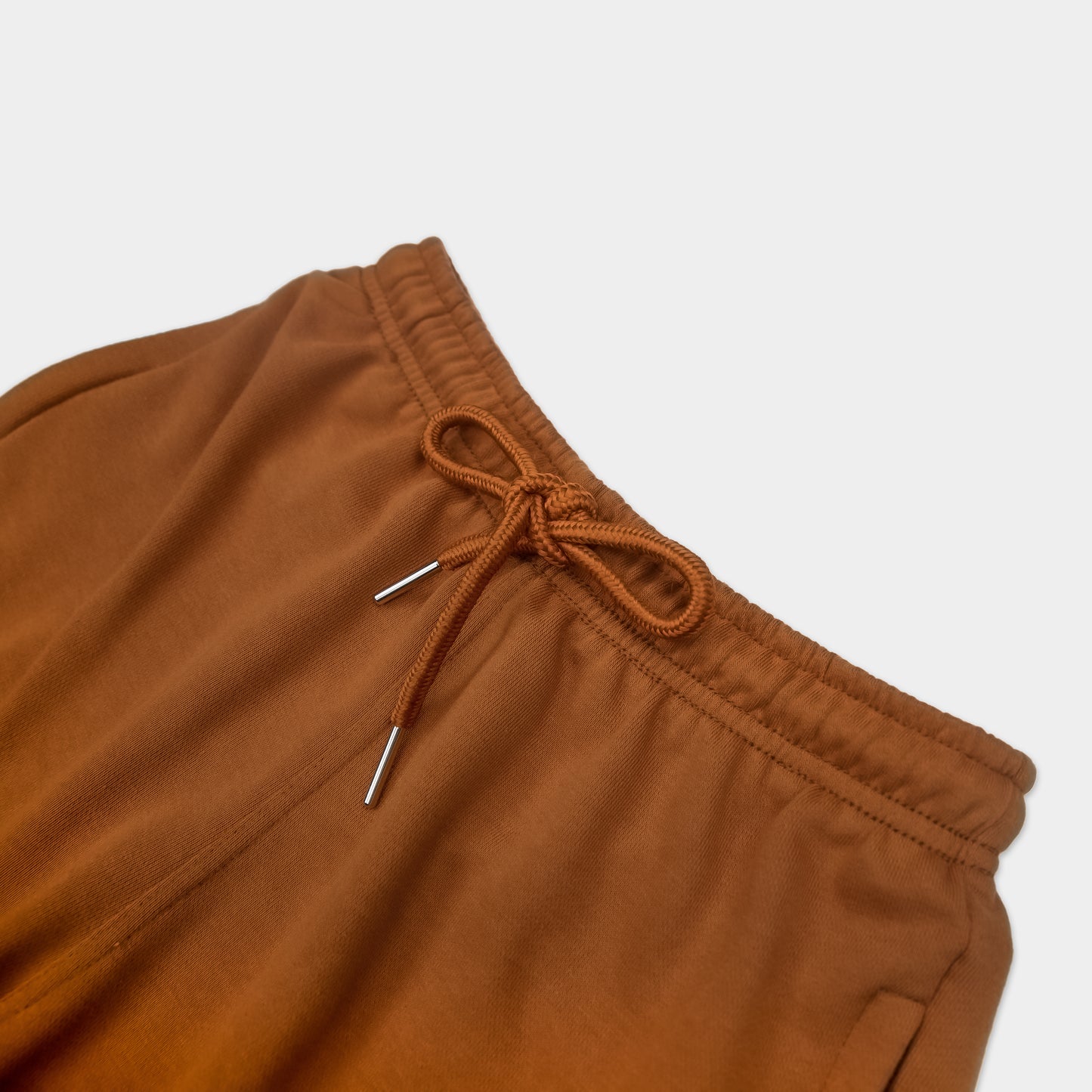 SADDLE SOLID SWEAT SHORTS WITH BLACK TERK EMBROIDERED LOGO
