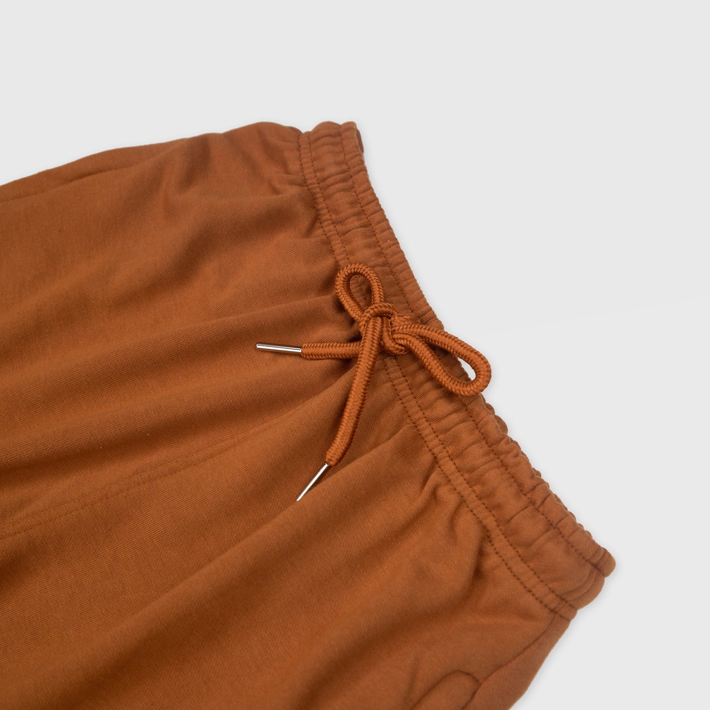 SADDLE SOLID SWEAT SHORTS WITH BROWN TERK EMBROIDERED LOGO