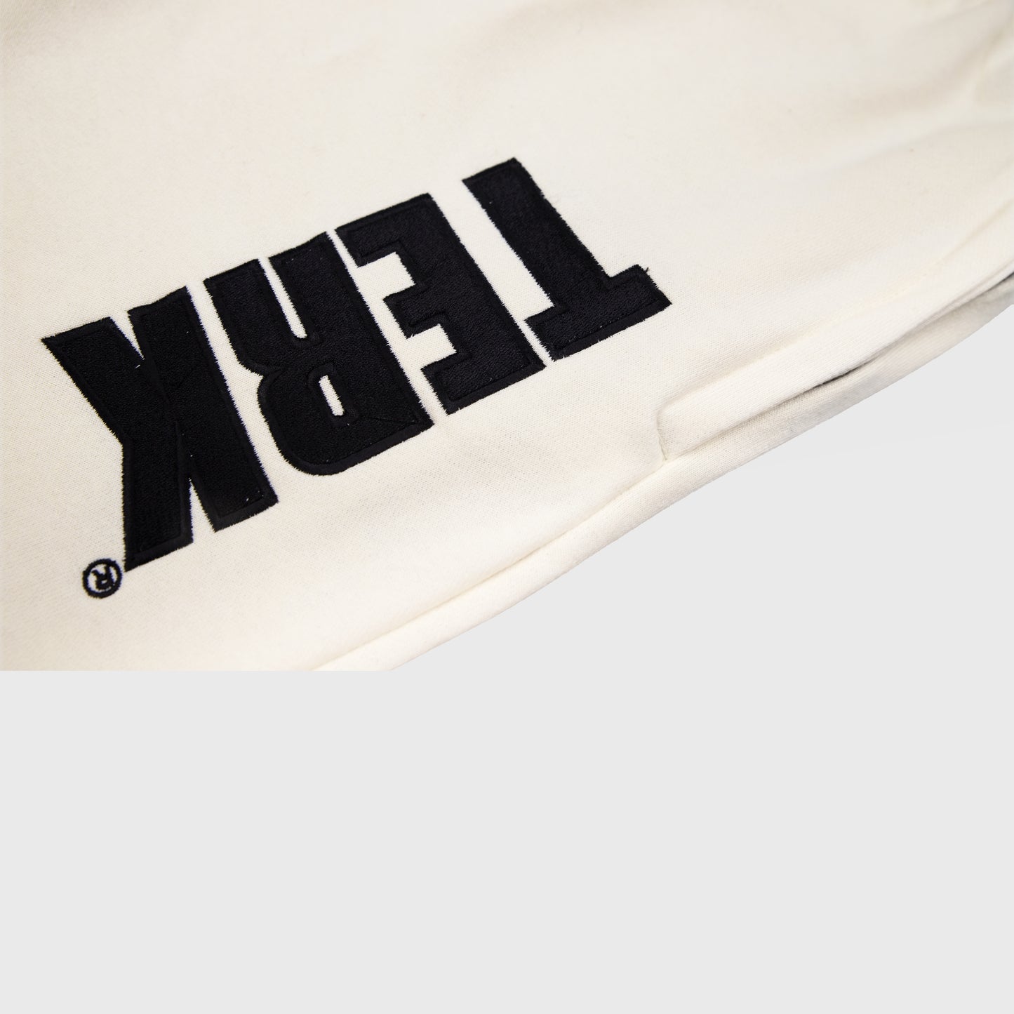 VANILLA SOLID SWEAT SHORTS WITH BLACK TERK EMBROIDERED LOGO