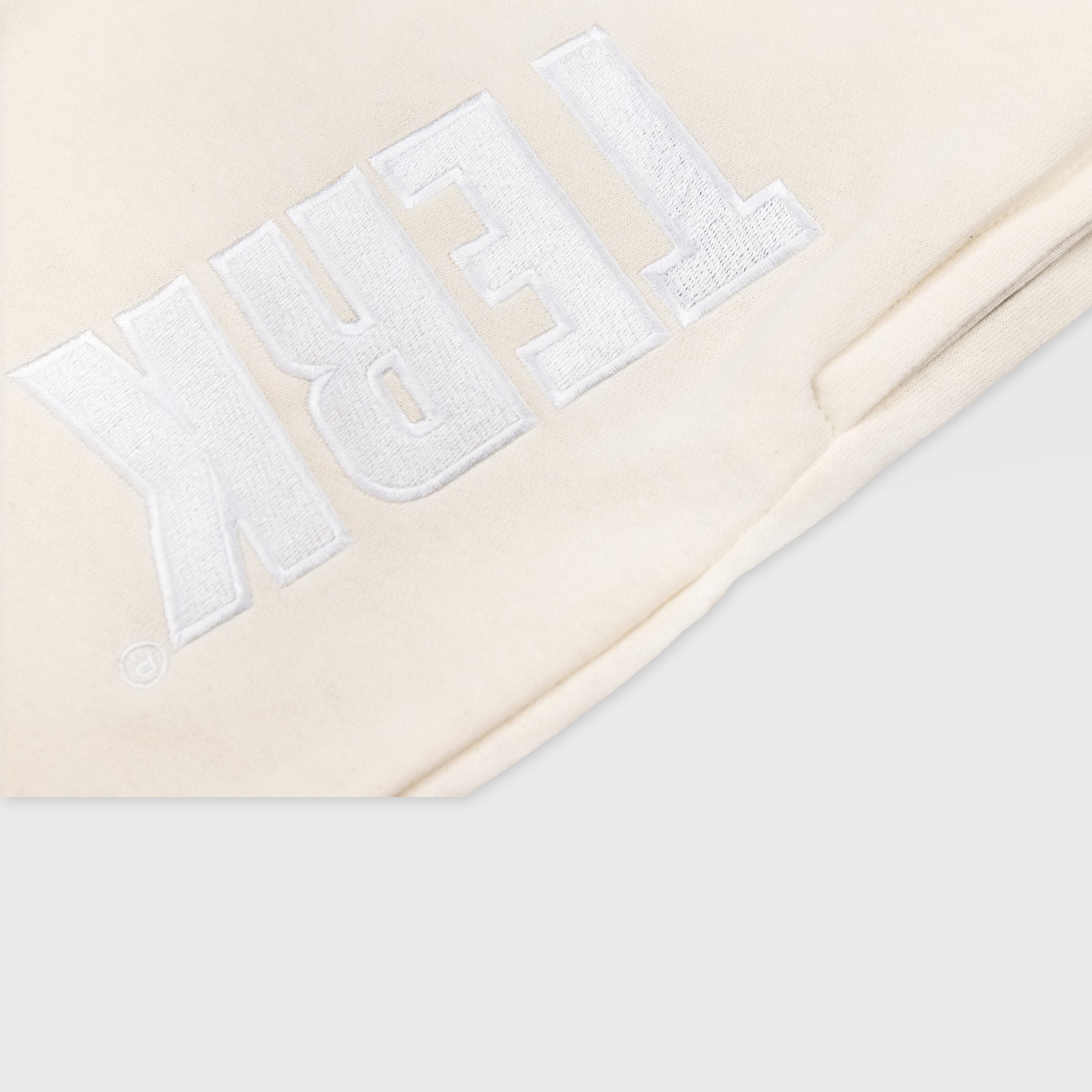 VANILLA SOLID SWEAT SHORTS WITH WHITE TERK EMBROIDERED LOGO