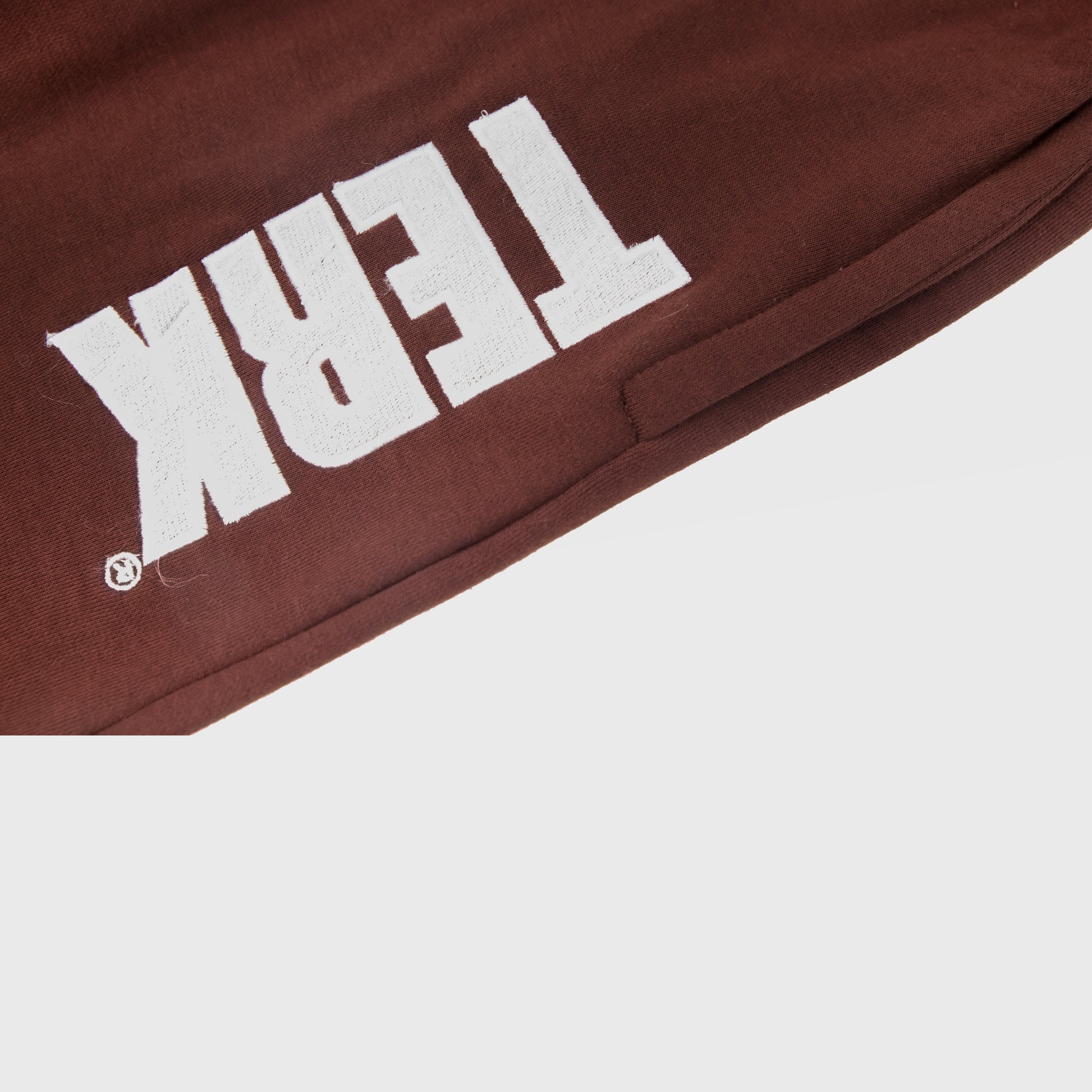 CHOCOLATE SWEATPANTS WITH WHITE TERK EMBROIDERED LOGO